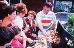 Family at a barbecue; Size=240 pixels wide
